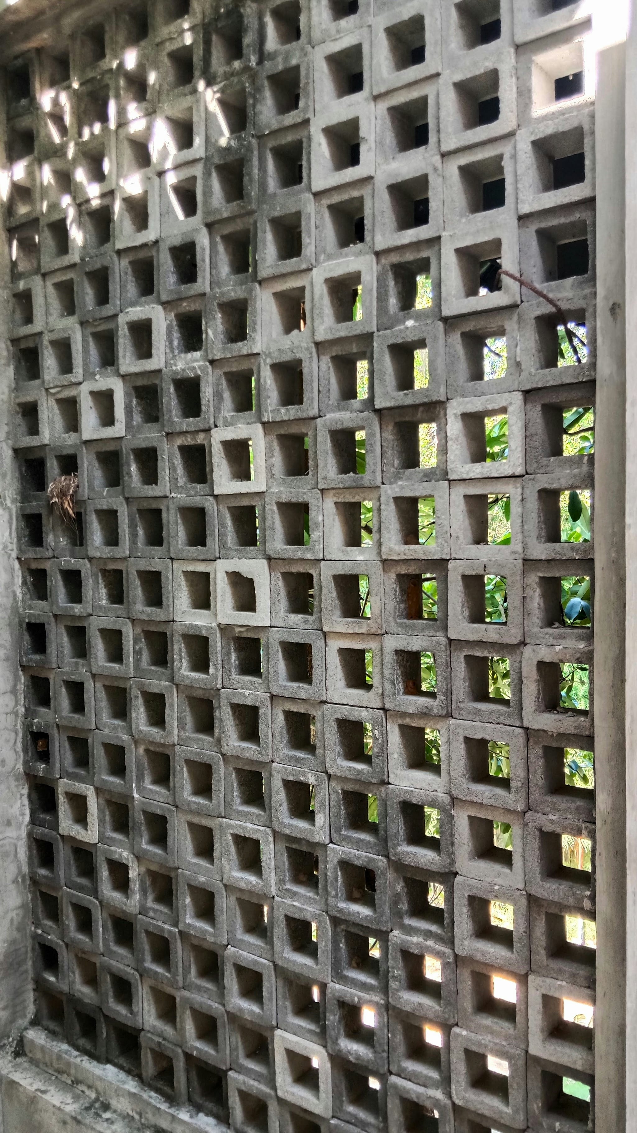 Unique Concrete Builders Eliza Grills — Eliza-pattern clay ventilation grills in a building