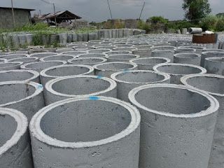 UCB 600mm Concrete Culvert — rows of large precast concrete culvert rings stacked in a production yard by Unique Concrete Builders Kenya