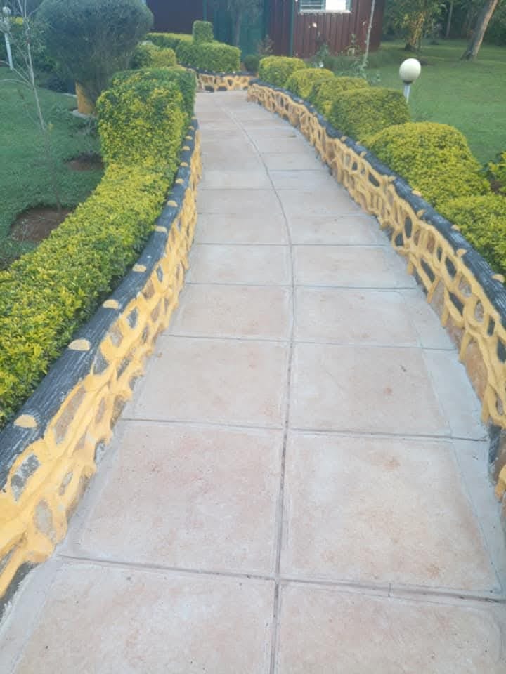 Uni Paver installation in progress at a Kenya property — UCB interlocking concrete paving blocks being laid
