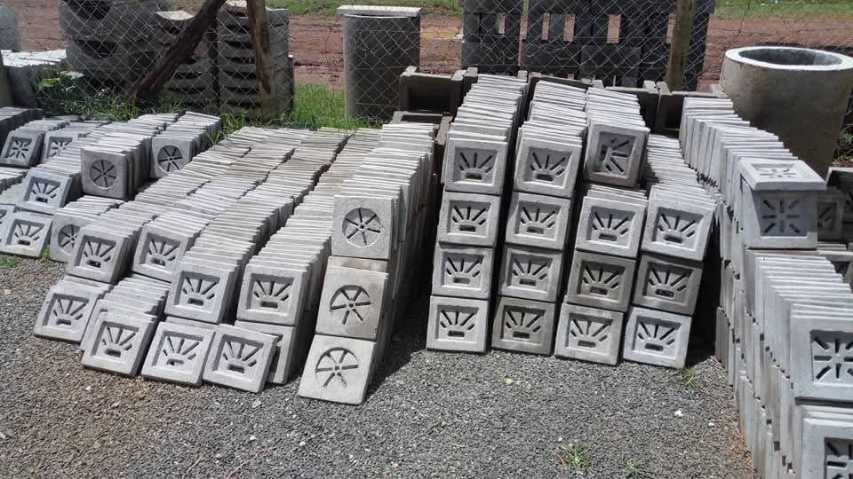 Unique Concrete Builders Concrete Vents — decorative perforated vent blocks with circular and sunburst cutout patterns at the UCB yard in Kenya