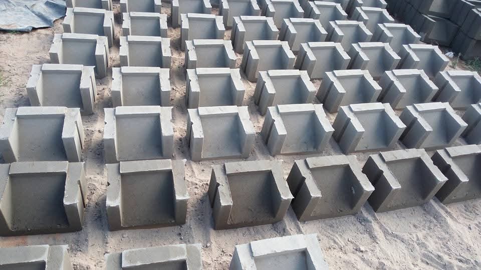 UCB Louvers — hollow U-shaped concrete louver blocks providing controlled ventilation and privacy screening on a building facade by Unique Concrete Builders Kenya